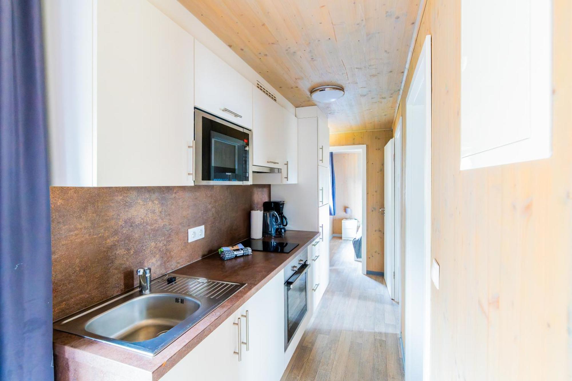 Naturcamping Lueneburger Heide - Chalets & Tiny Haeuser ゾルタウ エクステリア 写真